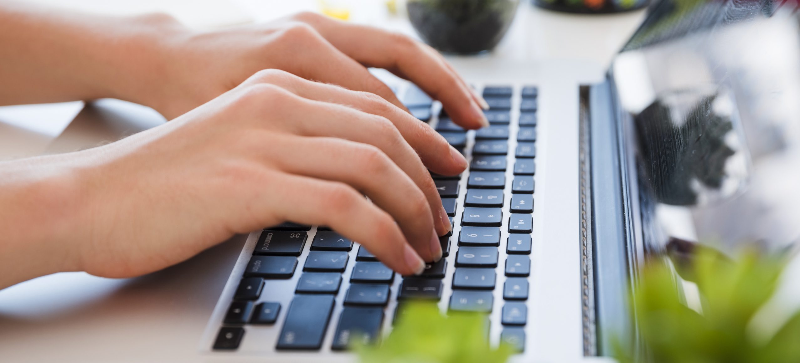 close-up-hands-typing-keyboard
